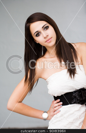 To use this stock image in your creative project, please select the size you need over to the right and click the "Add to Cart" button.
Your downloaded image will come with the Cutcaster watermark removed so don’t worry about the watermark you see on this page. Slightly angry looking young brunette. stock photo, Portrait of a slightly angry looking beautiful young brunette. by exvivo