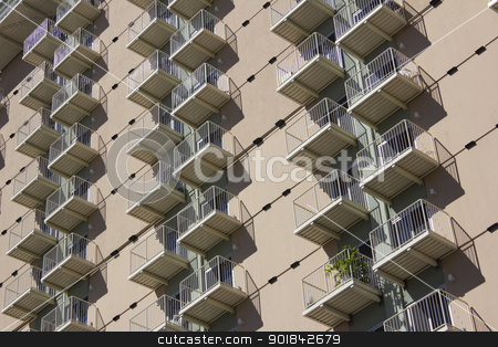 To use this stock image in your creative project, please select the size you need over to the right and click the "Add to Cart" button.
Your downloaded image will come with the Cutcaster watermark removed so don’t worry about the watermark you see on this page. Condo apartment building stock photo, the side of an apartment or condo building. by Jeremy Baumann