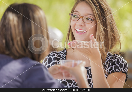 To use this stock image in your creative project, please select the size you need over to the right and click the "Add to Cart" button.
Your downloaded image will come with the Cutcaster watermark removed so don’t worry about the watermark you see on this page. Attractive Mixed Race Girlfriends Talking Over Drinks Outside stock photo, Attractive Mixed Race Girlfriends Talking Over Drinks Outdoors. by Andy Dean