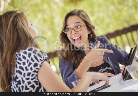 To use this stock image in your creative project, please select the size you need over to the right and click the "Add to Cart" button.
Your downloaded image will come with the Cutcaster watermark removed so don’t worry about the watermark you see on this page. Mixed Race Girls Working Together on Tablet Computer stock photo, Attractive Mixed Race Girls Smiling and Talking While Working on Tablet Computer Sitting Outdoors. by Andy Dean
