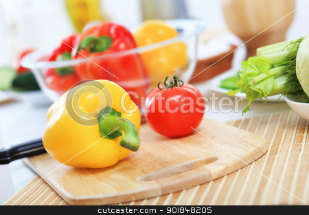 To use this stock image in your creative project, please select the size you need over to the right and click the "Add to Cart" button.
Your downloaded image will come with the Cutcaster watermark removed so don’t worry about the watermark you see on this page. Fresh healthy food stock photo, Fresh food and vegetables on the table by Sergey Nivens