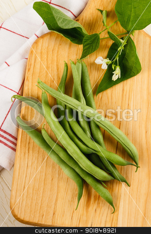 To use this stock image in your creative project, please select the size you need over to the right and click the "Add to Cart" button.
Your downloaded image will come with the Cutcaster watermark removed so don’t worry about the watermark you see on this page. Fresh Picked String Beans stock photo, Fresh picked green beans, also known as string beans or runner beans, are piled on a cutting board ready to prepare for a delicious meal by Karen Sarraga