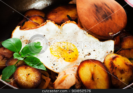 To use this stock image in your creative project, please select the size you need over to the right and click the "Add to Cart" button.
Your downloaded image will come with the Cutcaster watermark removed so don’t worry about the watermark you see on this page. fried potatoes stock photo, fried potatoes onion chicken and fried egg in a pan on a wooden table by p.studio66
