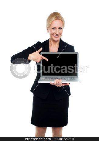 To use this stock image in your creative project, please select the size you need over to the right and click the "Add to Cart" button.
Your downloaded image will come with the Cutcaster watermark removed so don’t worry about the watermark you see on this page. Business lady indicating towards laptop screen stock photo, Smiling business lady indicating towards laptop screen isolated over white background by Ishay Botbol