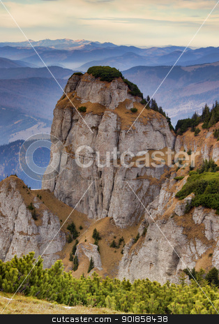 To use this stock image in your creative project, please select the size you need over to the right and click the "Add to Cart" button.
Your downloaded image will come with the Cutcaster watermark removed so don’t worry about the watermark you see on this page. mountain rock stock photo, rocky mountain formation in Romanian Carpathians by Ioan Panaite