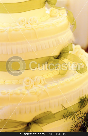 Wedding cake Wedding cake stock photo, Yellow cream wedding cake with green ribbons by Alessandro Rizzolli