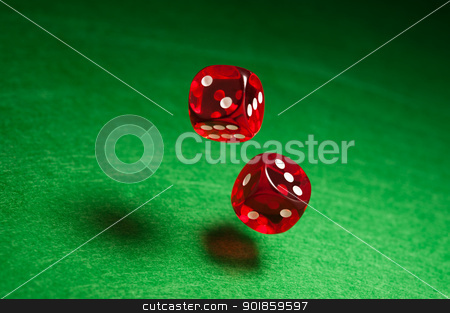Rolling red dice Rolling red dice stock photo, Rolling red dice over green surface by Ulrich Schade