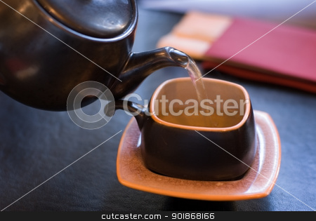 Pouring green tea. Pouring green tea. stock photo, Pouring green tea, shallow depth of field. by Piotr Skubisz