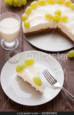 To use this stock image in your creative project, please select the size you need over to the right and click the "Add to Cart" button.
Your downloaded image will come with the Cutcaster watermark removed so don’t worry about the watermark you see on this page. Yoghurt cake with grape stock photo, Yoghurt cake with grape on dark wood table by Giordano Aita