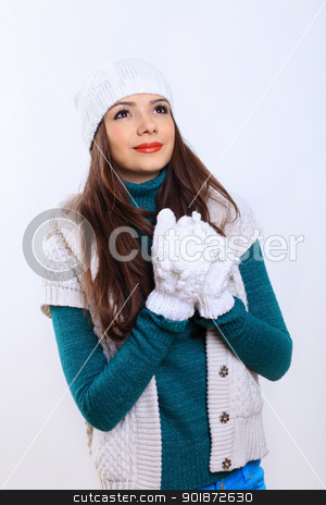 Young woman wearing winter hat and warm scarf Young woman wearing winter hat and warm scarf stock photo, Young pretty woman in warm winter hat and scarf by Sergey Nivens