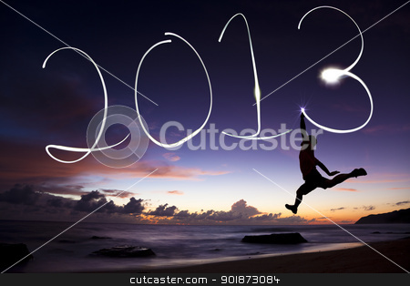 Young man jumping and drawing 2013 by flashlight young man jumping and drawing 2013 by flashlight stock photo, young man jumping and drawing 2013 by flashlight by tomwang