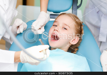 To use this stock image in your creative project, please select the size you need over to the right and click the "Add to Cart" button.
Your downloaded image will come with the Cutcaster watermark removed so don’t worry about the watermark you see on this page. Little girl visiting dentist stock photo, Little girl sitting in the dentists office by Sergey Nivens