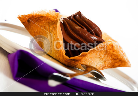 To use this stock image in your creative project, please select the size you need over to the right and click the "Add to Cart" button.
Your downloaded image will come with the Cutcaster watermark removed so don’t worry about the watermark you see on this page. Mousse au chocolat stock photo, Mousse au chocolat in a tuile basket on white wooden table by p.studio66