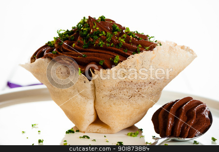 To use this stock image in your creative project, please select the size you need over to the right and click the "Add to Cart" button.
Your downloaded image will come with the Cutcaster watermark removed so don’t worry about the watermark you see on this page. Mousse au chocolat stock photo, Mousse au chocolat in a tuile basket on white wooden table by p.studio66