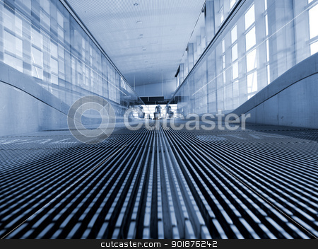 To use this stock image in your creative project, please select the size you need over to the right and click the "Add to Cart" button.
Your downloaded image will come with the Cutcaster watermark removed so don’t worry about the watermark you see on this page. Moving Walkway stock photo, A moving walkway at a modern airport by Walter Arce