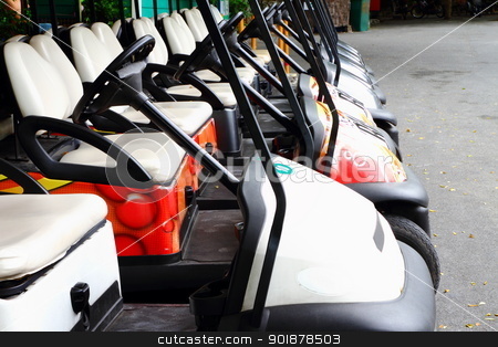 To use this stock image in your creative project, please select the size you need over to the right and click the "Add to Cart" button.
Your downloaded image will come with the Cutcaster watermark removed so don’t worry about the watermark you see on this page. Golf carts stock photo, Golf carts on a parking lot by kongsky