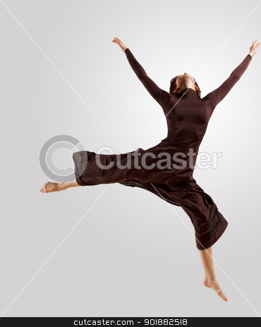 To use this stock image in your creative project, please select the size you need over to the right and click the "Add to Cart" button.
Your downloaded image will come with the Cutcaster watermark removed so don’t worry about the watermark you see on this page. Girl in dark dress dancing stock photo, Girl dancing in a dark dress with a gray background. isolate by Sergey Nivens