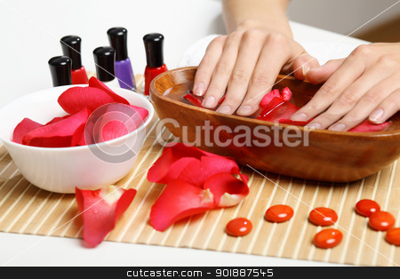 Woman is getting manicure Woman is getting manicure stock photo, Young woman is getting manicure in a beauty salon by Sergey Nivens