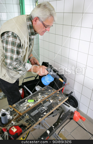 To use this stock image in your creative project, please select the size you need over to the right and click the "Add to Cart" button.
Your downloaded image will come with the Cutcaster watermark removed so don’t worry about the watermark you see on this page. Grey-haired handyman using blow torch stock photo, Grey-haired handyman using blow torch by photography33