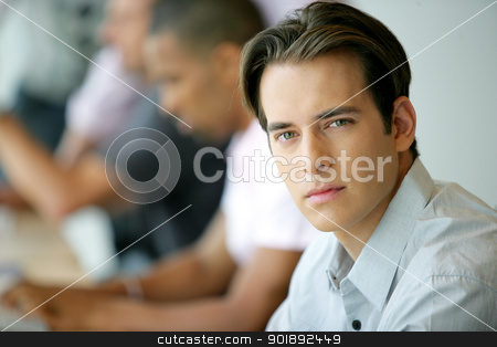 To use this stock image in your creative project, please select the size you need over to the right and click the "Add to Cart" button.
Your downloaded image will come with the Cutcaster watermark removed so don’t worry about the watermark you see on this page. Handsome young man in an office environment stock photo, Handsome young man in an office environment by photography33