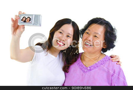 To use this stock image in your creative project, please select the size you need over to the right and click the "Add to Cart" button.
Your downloaded image will come with the Cutcaster watermark removed so don’t worry about the watermark you see on this page. Self photographing stock photo, Asian girl and senior mother self photographing, isolated on white by szefei