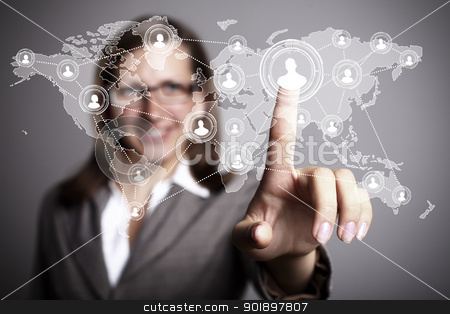 Businesswoman pressing social media icon Businesswoman pressing social media icon stock photo, Businesswoman in suit pressing social media icon by Sergey Nivens