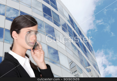 Smart businesswoman making call outdoors near building smart businesswoman making call outdoors near building stock photo, smart businesswoman making call outdoors near building by photography33