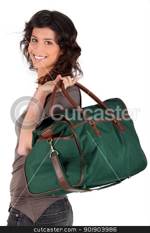 Woman carrying a weekend bag Woman carrying a weekend bag stock photo, Woman carrying a weekend bag by photography33