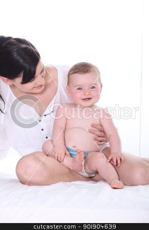 To use this stock image in your creative project, please select the size you need over to the right and click the "Add to Cart" button.
Your downloaded image will come with the Cutcaster watermark removed so don’t worry about the watermark you see on this page. Young mum with her gorgeous baby girl stock photo, Young mum with her gorgeous baby girl by photography33