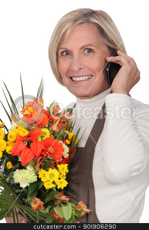 To use this stock image in your creative project, please select the size you need over to the right and click the "Add to Cart" button.
Your downloaded image will come with the Cutcaster watermark removed so don’t worry about the watermark you see on this page. mature florist holding bouquet stock photo, mature florist holding bouquet by photography33