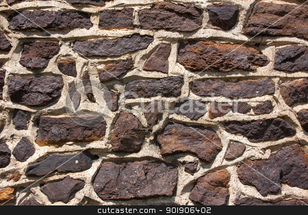 Stone Wall Stone Wall stock photo, Dark stone wall detail with irregular pattern. Background by Darren Pullman
