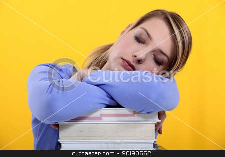 To use this stock image in your creative project, please select the size you need over to the right and click the "Add to Cart" button.
Your downloaded image will come with the Cutcaster watermark removed so don’t worry about the watermark you see on this page. Student asleep on her books stock photo, Student asleep on her books by photography33