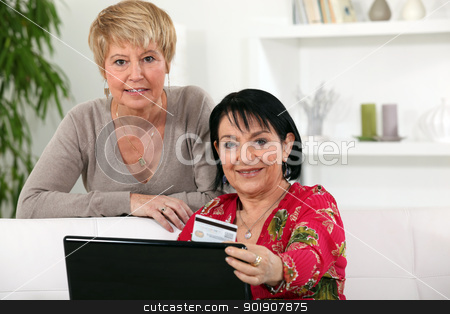 To use this stock image in your creative project, please select the size you need over to the right and click the "Add to Cart" button.
Your downloaded image will come with the Cutcaster watermark removed so don’t worry about the watermark you see on this page. Two middle-aged women shopping online stock photo, Two middle-aged women shopping online by photography33