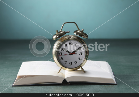 To use this stock image in your creative project, please select the size you need over to the right and click the "Add to Cart" button.
Your downloaded image will come with the Cutcaster watermark removed so don’t worry about the watermark you see on this page. alarm clock on open book stock photo, Close up of books and alarm clock by eskaylim