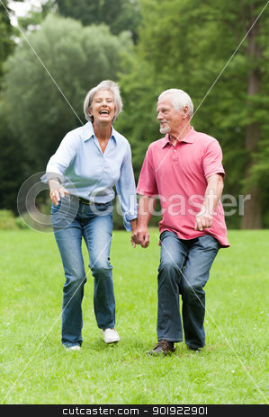 To use this stock image in your creative project, please select the size you need over to the right and click the "Add to Cart" button.
Your downloaded image will come with the Cutcaster watermark removed so don’t worry about the watermark you see on this page. Active seniors stock photo, Active senior couple in the park by Picturehunter