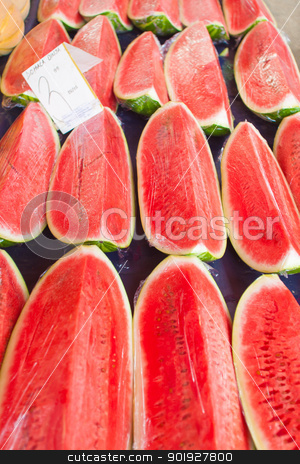 Watermelon Watermelon stock photo, Freshly sliced watermelon on stand at market by Paul Prescott