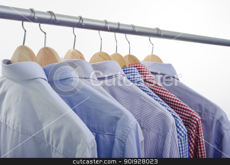Shirts hanger shirts hanger stock photo, clothes hanger with shirts isolated on white background by tommaso79