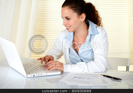 To use this stock image in your creative project, please select the size you need over to the right and click the "Add to Cart" button.
Your downloaded image will come with the Cutcaster watermark removed so don’t worry about the watermark you see on this page. Smiling caucasian secretary using her laptop stock photo, Smiling caucasian secretary using her laptop at workplace by pablocalvog