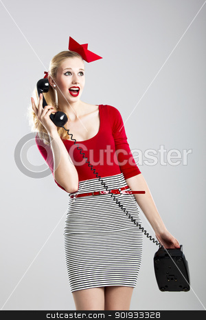 To use this stock image in your creative project, please select the size you need over to the right and click the "Add to Cart" button.
Your downloaded image will come with the Cutcaster watermark removed so don’t worry about the watermark you see on this page. Fashion woman with a phone stock photo, Beautiful fashion woman with a astonished expresion and holding a vintage phone by ikostudio
