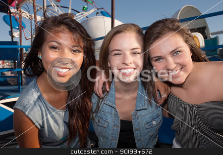 To use this stock image in your creative project, please select the size you need over to the right and click the "Add to Cart" button.
Your downloaded image will come with the Cutcaster watermark removed so don’t worry about the watermark you see on this page. Best Friends Hanging Out Together stock photo, Group of three cheerful teenage girls embracing each other by Scott Griessel