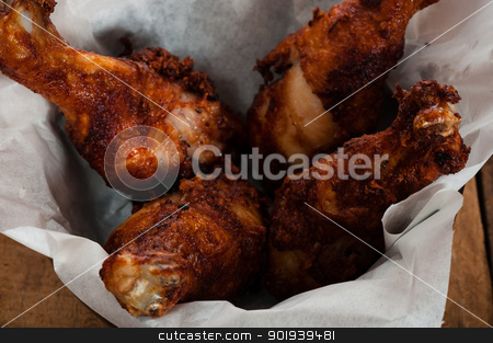 To use this stock image in your creative project, please select the size you need over to the right and click the "Add to Cart" button.
Your downloaded image will come with the Cutcaster watermark removed so don’t worry about the watermark you see on this page. chicken drumsticks stock photo, Four chicken drumsticks in a bowl on a wooden table by p.studio66