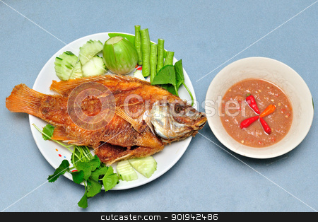 To use this stock image in your creative project, please select the size you need over to the right and click the "Add to Cart" button.
Your downloaded image will come with the Cutcaster watermark removed so don’t worry about the watermark you see on this page. Pan fried fish stock photo, Pan fried fish , chili sauce , vegetable by bigjom