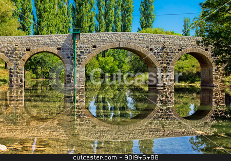 To use this stock image in your creative project, please select the size you need over to the right and click the "Add to Cart" button.
Your downloaded image will come with the Cutcaster watermark removed so don’t worry about the watermark you see on this page. Stone bridge over Zrmanja river stock photo, Stone bridge over Zrmanja river in Kastel Zegarski, Dalmatia, Croatia by xbrchx