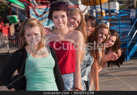 To use this stock image in your creative project, please select the size you need over to the right and click the "Add to Cart" button.
Your downloaded image will come with the Cutcaster watermark removed so don’t worry about the watermark you see on this page. Teens Standing Behind Each Other stock photo, Smiling group of teenage girls standing behind each other by Scott Griessel