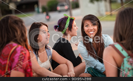 To use this stock image in your creative project, please select the size you need over to the right and click the "Add to Cart" button.
Your downloaded image will come with the Cutcaster watermark removed so don’t worry about the watermark you see on this page. Diverse Group of Teenage Girls Talking stock photo, Diverse group of happy teenage girls sitting and talking by Scott Griessel