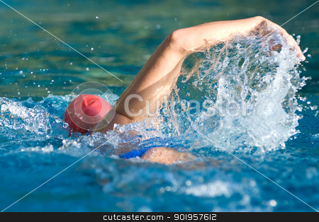 To use this stock image in your creative project, please select the size you need over to the right and click the "Add to Cart" button.
Your downloaded image will come with the Cutcaster watermark removed so don’t worry about the watermark you see on this page. Swimmer stock photo, Athletic swimmer in action in a swimming pool by Picturehunter
