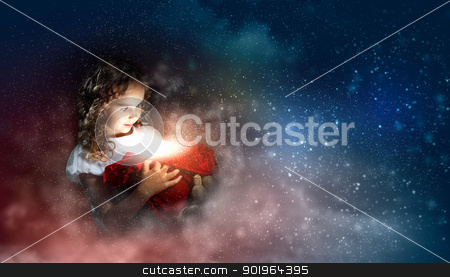 Happy girl opening gift box Happy girl opening gift box stock photo, A cute young girl holding a christmas gift, dark background with christmas light bokeh by Sergey Nivens