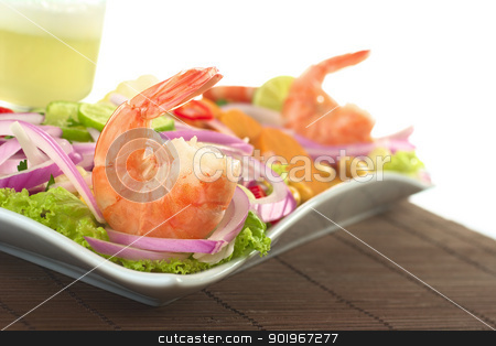 To use this stock image in your creative project, please select the size you need over to the right and click the "Add to Cart" button.
Your downloaded image will come with the Cutcaster watermark removed so don’t worry about the watermark you see on this page. Peruvian Prawn Ceviche stock photo, Peruvian ceviche with king prawn, red onion, lime, cooked sweet potato and the Peruvian cocktail called Pisco Sour in the back (Selective Focus, Focus on the first king prawn) by Ildiko Papp
