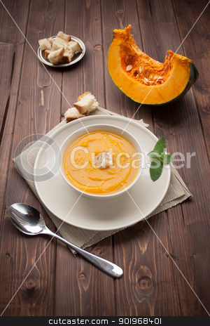 To use this stock image in your creative project, please select the size you need over to the right and click the "Add to Cart" button.
Your downloaded image will come with the Cutcaster watermark removed so don’t worry about the watermark you see on this page. Vellutata di zucca - pumpkin soup stock photo, Bowl of pumpkin soup with bread crouton on white wood table by Giordano Aita