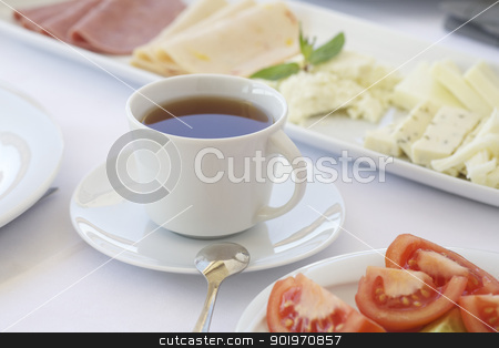 To use this stock image in your creative project, please select the size you need over to the right and click the "Add to Cart" button.
Your downloaded image will come with the Cutcaster watermark removed so don’t worry about the watermark you see on this page. A cup of tea on breakfast table stock photo, Breakfast table with cheese and tomatoes by necati turker
